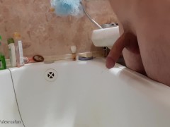'Russian teen with big dick pisses in the bathroom and cums'