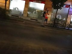 Straight guy pissing on the street