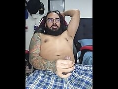 Rasta tattooed guy jerking off oiled up, two hands masturbation, cumming hard
