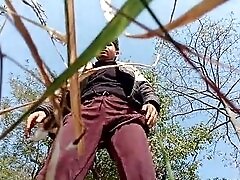 Young Indian army man masturbating in the wild